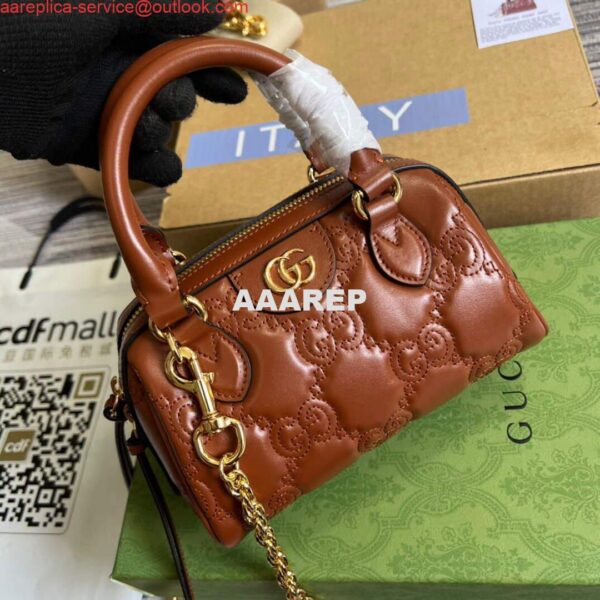 Replica Gucci 702251 GG matelassé leather top handle bag Brown 5