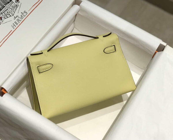 Replica Hermes Kelly Pouchette Swift Leather clutch bag Gold H230272 3